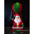 Happy holiday inflatable santa in hot air balloon